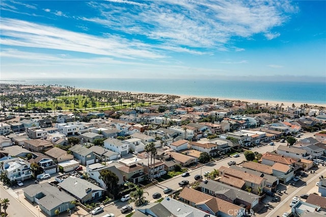 birds eye view of property featuring a water view and a residential view