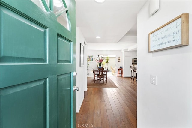 entryway featuring recessed lighting and dark wood-style floors