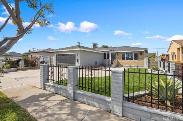 view of front facade featuring driveway, a fenced front yard, a garage, a front lawn, and stucco siding