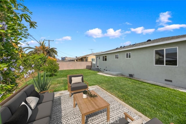 view of yard featuring fence, a patio area, and entry steps