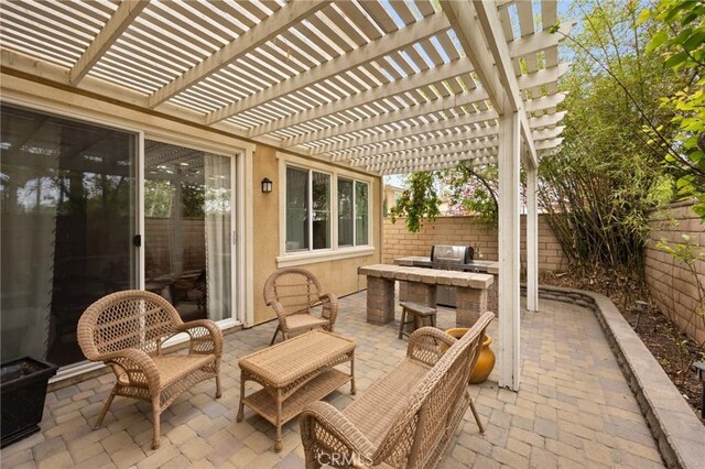 view of patio / terrace featuring area for grilling, a pergola, and a fenced backyard