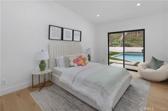 bedroom featuring access to outside, recessed lighting, baseboards, and wood finished floors