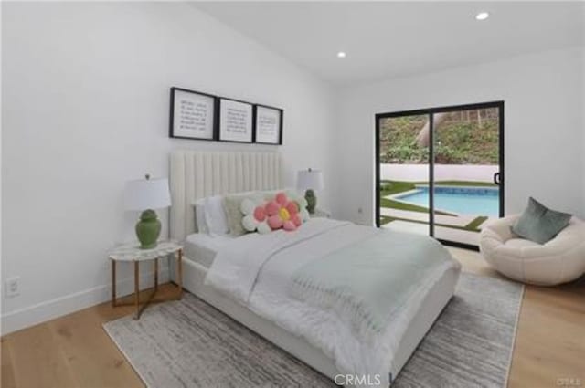 bedroom with baseboards, access to outside, recessed lighting, and wood finished floors