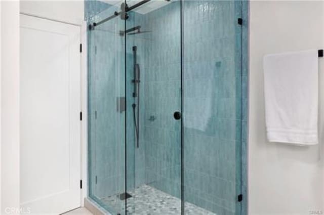 bathroom featuring a stall shower