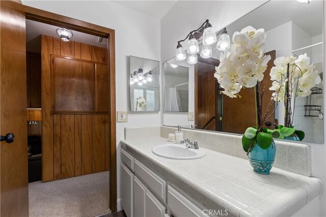 full bath featuring vanity