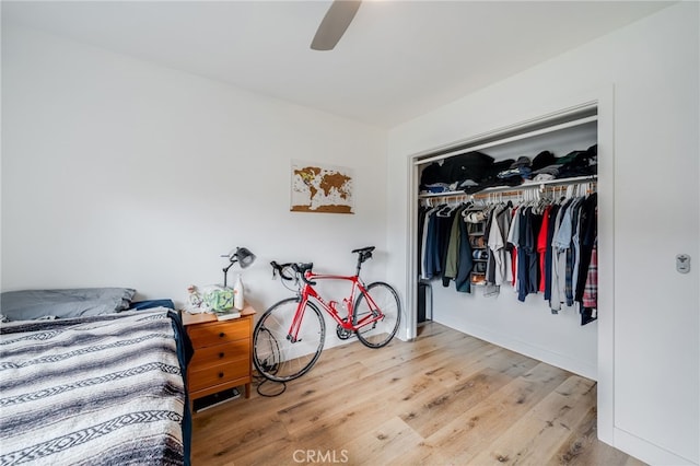 129 Avenida Rosa, San Clemente, CA 92672 - bedroom with a closet, a ceiling fan, baseboards, and wood finished floors