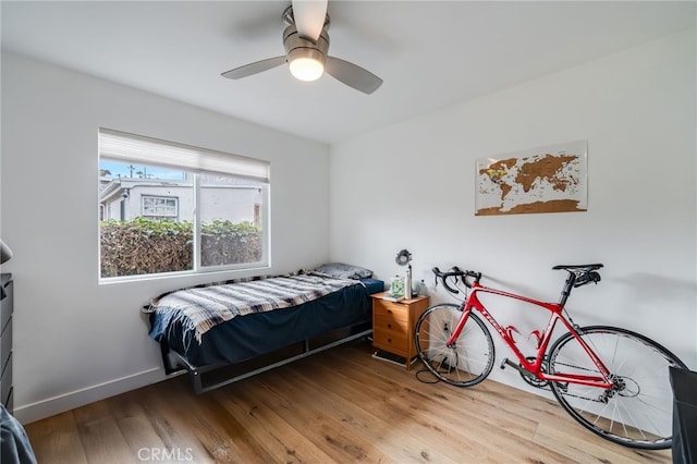 129 Avenida Rosa, San Clemente, CA 92672 - bedroom with a ceiling fan, baseboards, and wood finished floors