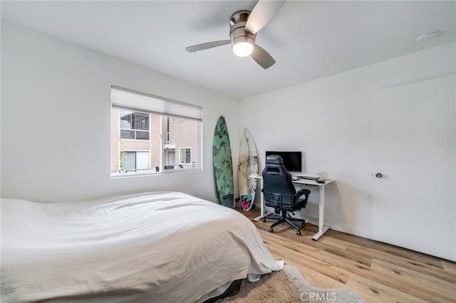 129 Avenida Rosa, San Clemente, CA 92672 - bedroom with light wood-style floors and a ceiling fan