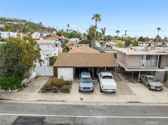 129 Avenida Rosa, San Clemente, CA 92672 - view of front facade featuring a residential view, fence, a gate, and driveway