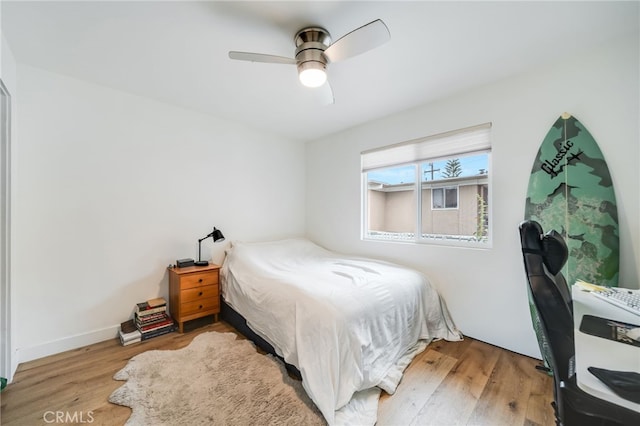 129 Avenida Rosa, San Clemente, CA 92672 - bedroom featuring a ceiling fan and wood finished floors