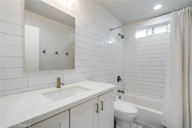 129 Avenida Rosa, San Clemente, CA 92672 - full bath featuring vanity, toilet, tile walls, tasteful backsplash, and shower / tub combo