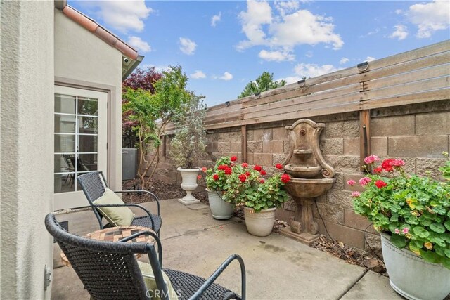 view of patio with a fenced backyard