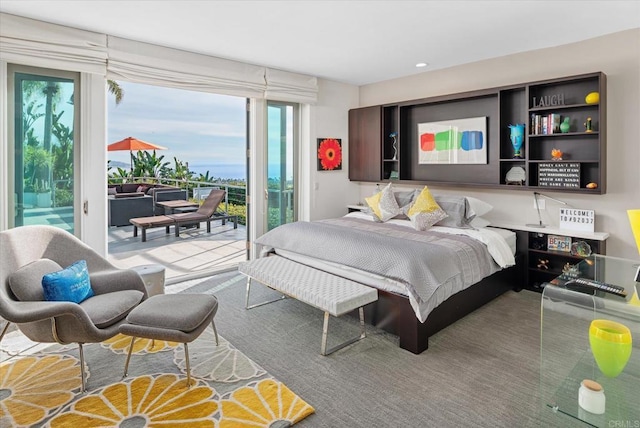 bedroom with access to outside and recessed lighting
