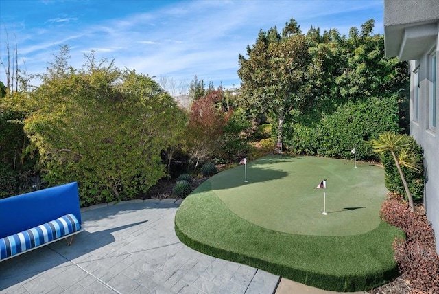 surrounding community with a patio