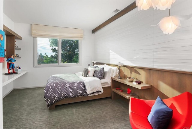 bedroom featuring carpet and visible vents