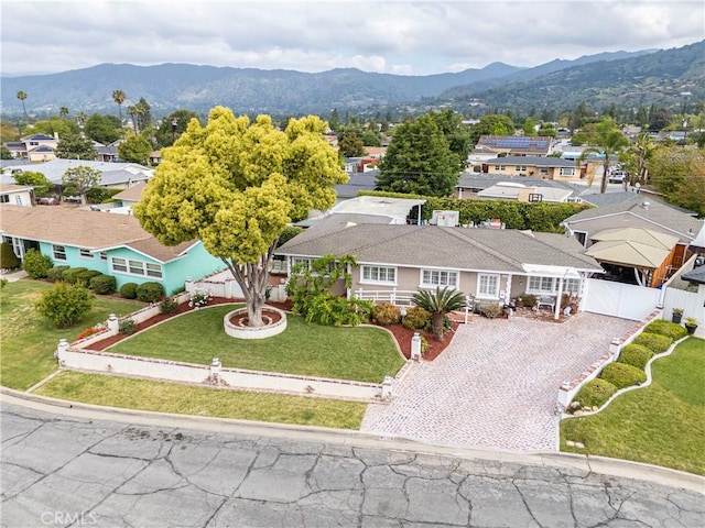 bird's eye view featuring a residential view and a mountain view