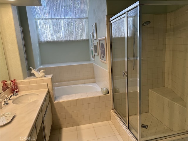 17 Marseille, Laguna Niguel, CA 92677 - full bathroom featuring tile patterned flooring, vanity, a bath, and a shower stall