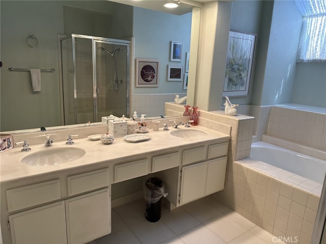 17 Marseille, Laguna Niguel, CA 92677 - full bathroom featuring a sink, a garden tub, a shower stall, and double vanity