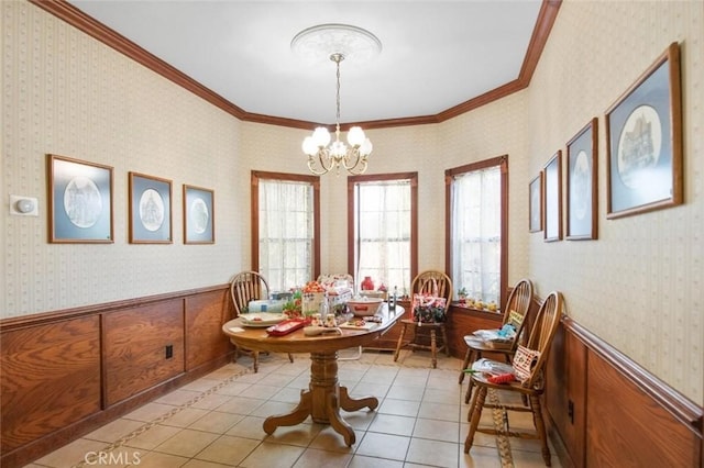 3716 Viader Dr, Modesto, CA 95356 - dining space featuring plenty of natural light, a chandelier, ornamental molding, wainscoting, and wallpapered walls