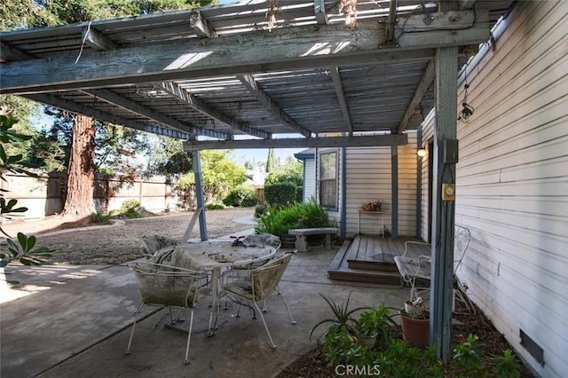 3716 Viader Dr, Modesto, CA 95356 - view of patio / terrace featuring fence, a pergola, and outdoor dining space