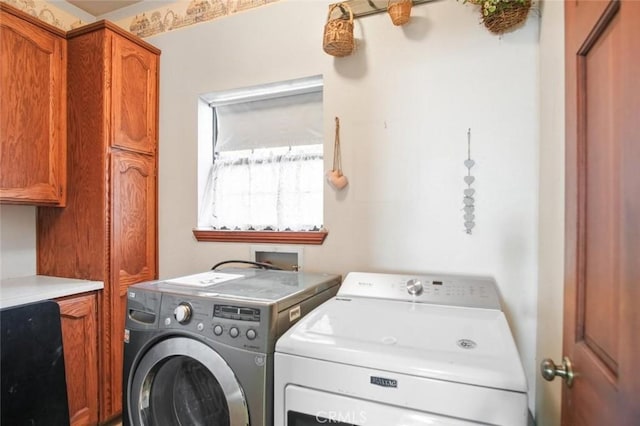 3716 Viader Dr, Modesto, CA 95356 - washroom with cabinet space and washing machine and clothes dryer