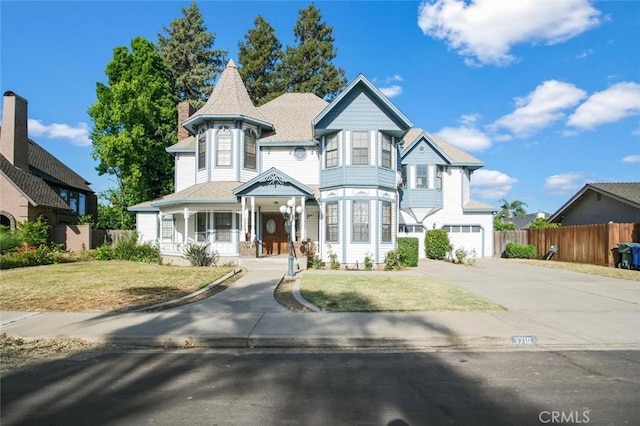 3716 Viader Dr, Modesto, CA 95356 - victorian-style house with concrete driveway and a garage