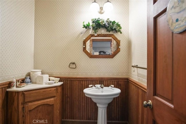 3716 Viader Dr, Modesto, CA 95356 - half bathroom with wallpapered walls and wainscoting