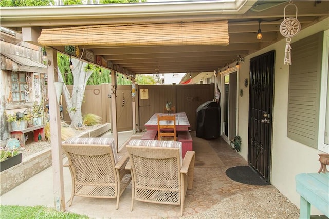3139 E Chapman Ave Unit 14A, Orange, CA 92869 - view of patio / terrace with fence and outdoor dining area
