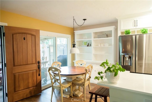 3139 E Chapman Ave Unit 14A, Orange, CA 92869 - dining space with dark wood-style flooring