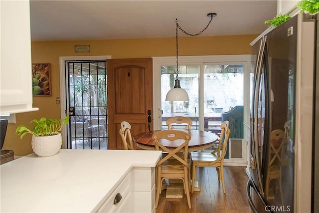 3139 E Chapman Ave Unit 14A, Orange, CA 92869 - dining room featuring dark wood-type flooring