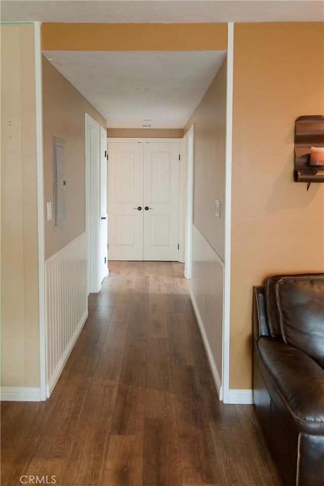 3139 E Chapman Ave Unit 14A, Orange, CA 92869 - corridor featuring dark wood-style floors, baseboards, and electric panel