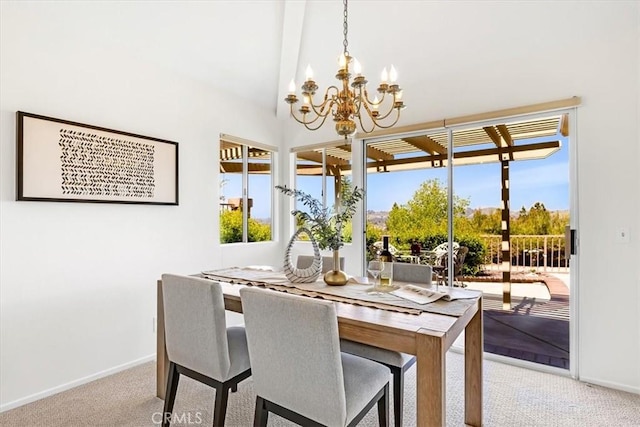 dining room featuring carpet floors, baseboards, lofted ceiling with beams, and a notable chandelier