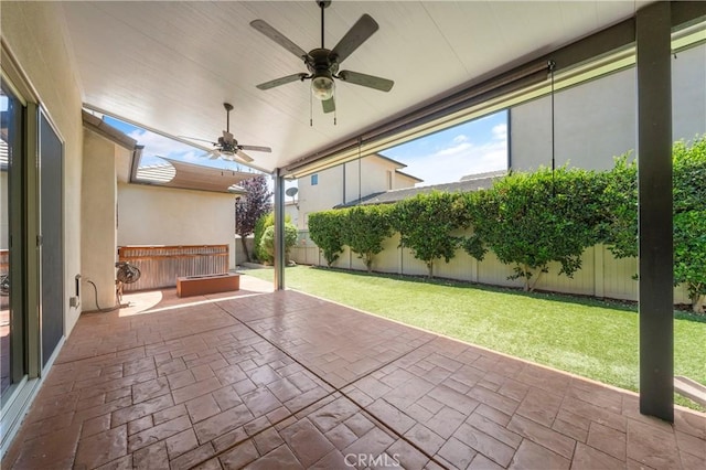 view of patio with ceiling fan and a fenced backyard