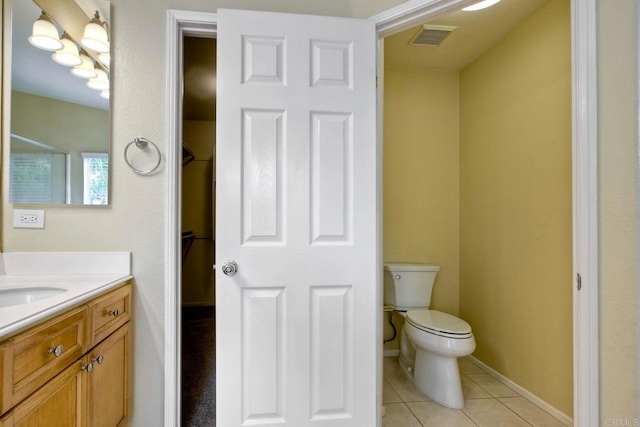 full bath featuring tile patterned flooring, vanity, toilet, baseboards, and visible vents