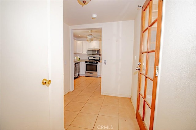 66365 5th St, Desert Hot Springs, CA 92240 - corridor with light tile patterned floors