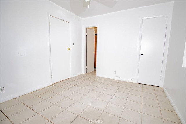 66365 5th St, Desert Hot Springs, CA 92240 - empty room featuring ceiling fan and light tile patterned flooring