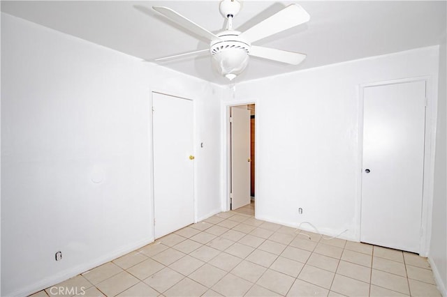 66365 5th St, Desert Hot Springs, CA 92240 - spare room featuring a ceiling fan, baseboards, and light tile patterned floors