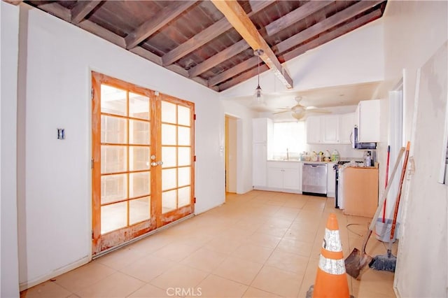 66365 5th St, Desert Hot Springs, CA 92240 - kitchen with stainless steel dishwasher, beam ceiling, white cabinetry, wooden ceiling, and french doors