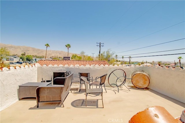 66365 5th St, Desert Hot Springs, CA 92240 - view of patio featuring a mountain view
