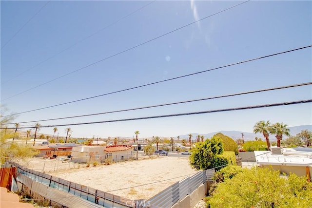 66365 5th St, Desert Hot Springs, CA 92240 - view of yard with fence and a mountain view