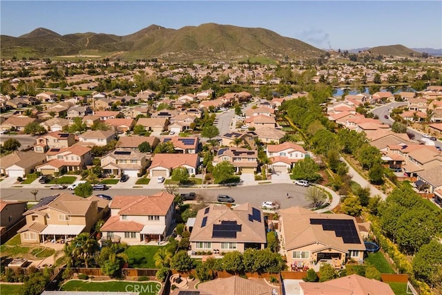 bird's eye view with a residential view and a mountain view