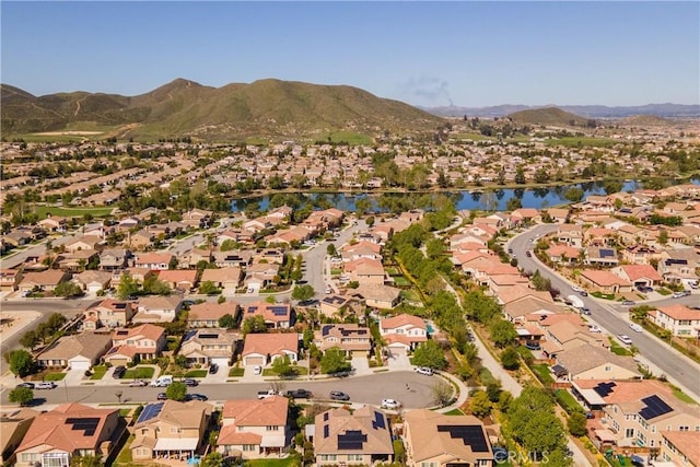 aerial view with a residential view and a water and mountain view