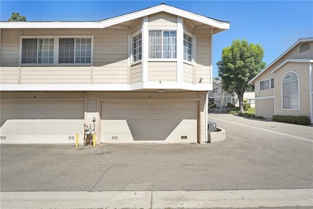 exterior space with an attached garage