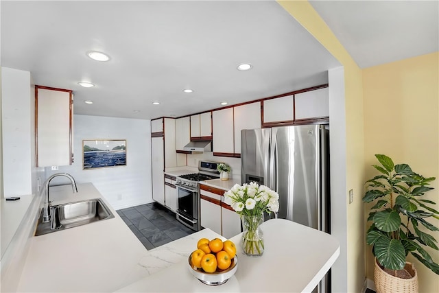 11300 Foothill Blvd Unit 97, Sylmar, CA 91342 - kitchen featuring stainless steel appliances, a sink, recessed lighting, light countertops, and white cabinets