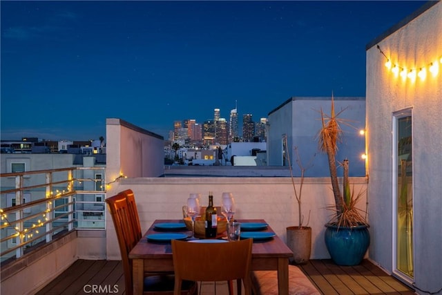 1055 S Serrano Ave Unit 502, Los Angeles, CA 90006 - exterior space featuring a view of city lights and a balcony
