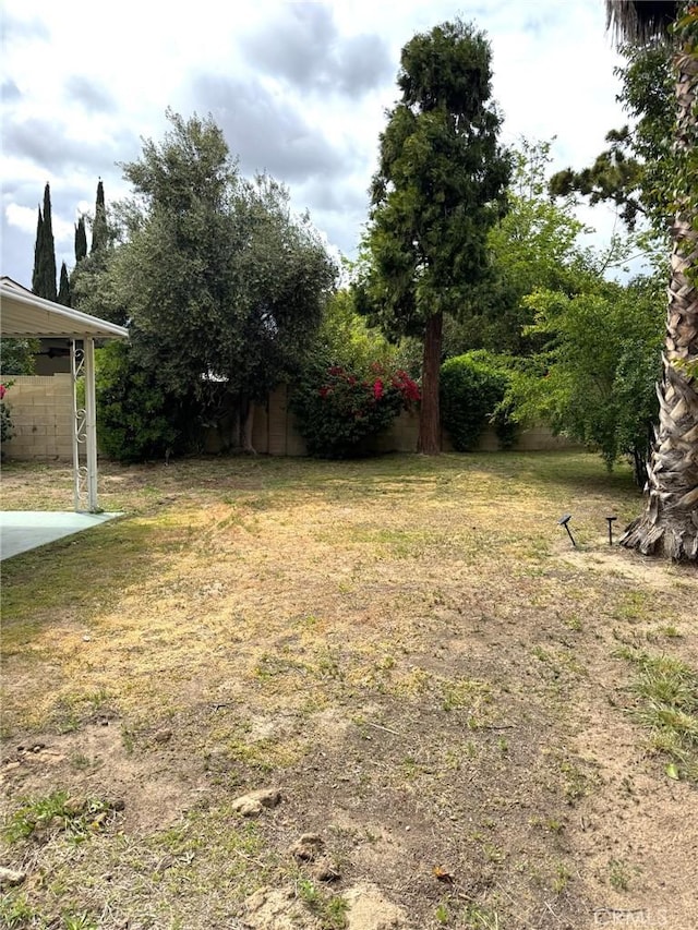 view of yard with fence