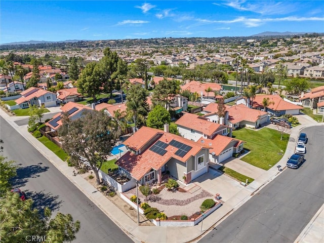 aerial view with a mountain view and a residential view