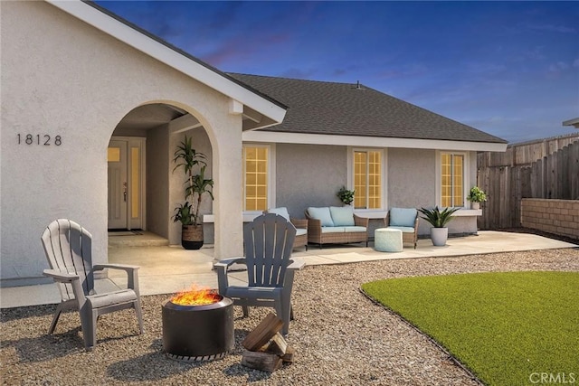 18128 Cari Ln, Yorba Linda, CA 92886 - view of patio / terrace featuring an outdoor fire pit and fence