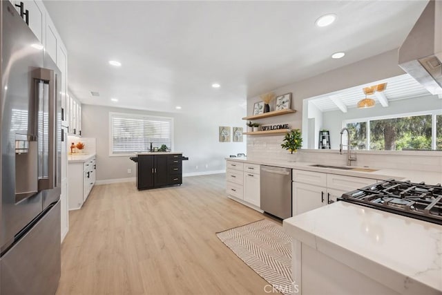18128 Cari Ln, Yorba Linda, CA 92886 - kitchen featuring plenty of natural light, a sink, light wood-style floors, and appliances with stainless steel finishes