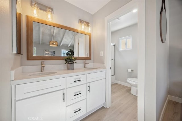 18128 Cari Ln, Yorba Linda, CA 92886 - full bathroom featuring a sink, baseboards, toilet, and wood finished floors
